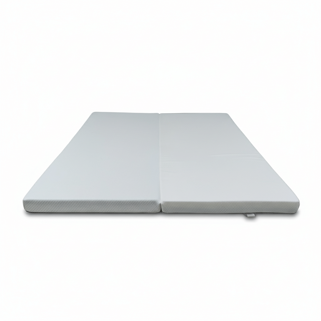 Front view of a white foldable dual-firmness mattress topper on a clean white background