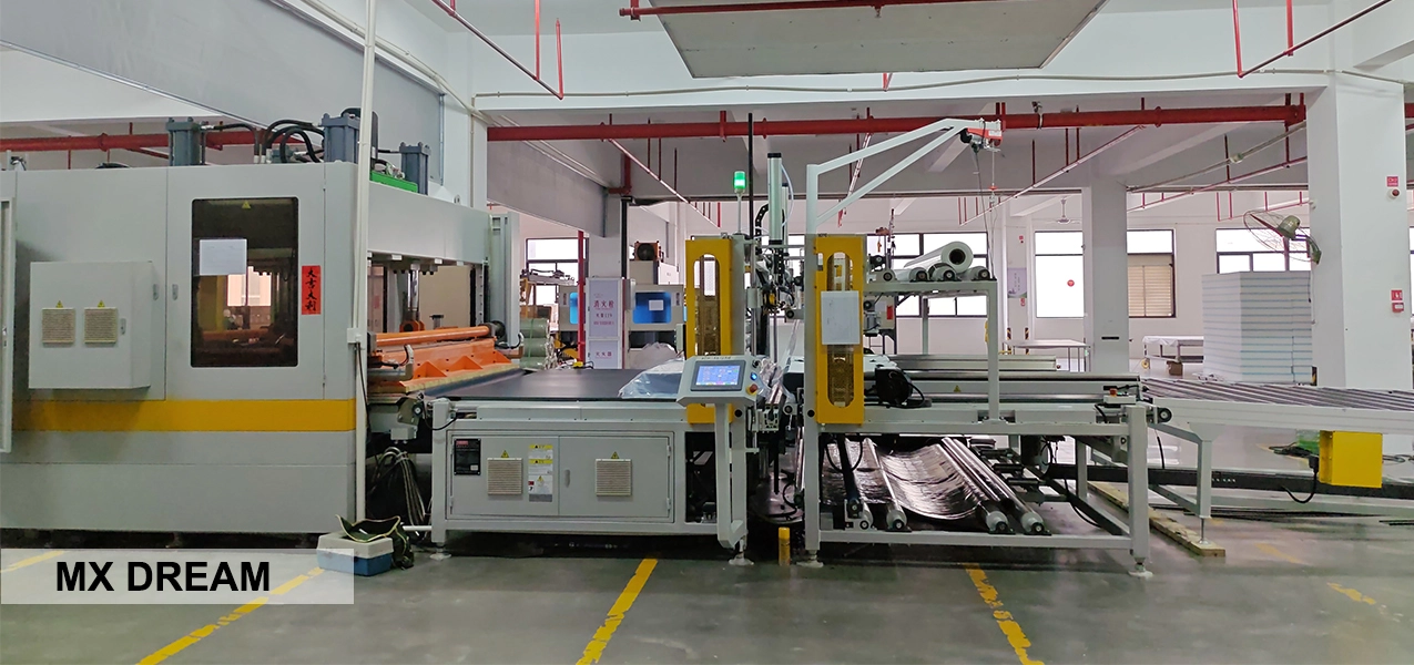 MX DREAM Furniture Factory: Our industrial-grade 1000-ton hydraulic vacuum compression machine is processing foam modules. This machine is the key technology for achieving a 300% increase in container loading and significantly reducing logistics costs for our B2B clients