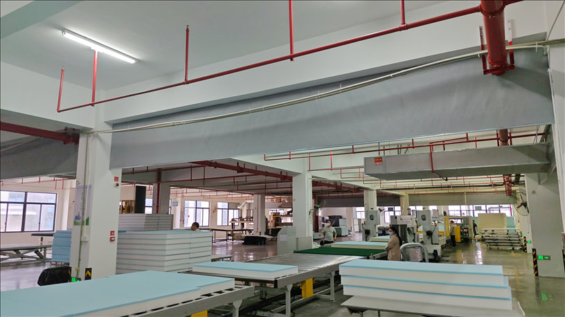 High-density composite foam layers on an automated production line in the MX DREAM source factory, ensuring consistent quality for all-foam sofas