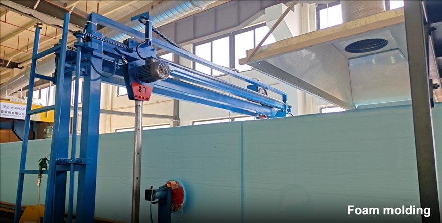 Inner factory view of the in-house foam molding production line for compact sofas. This image illustrates the 