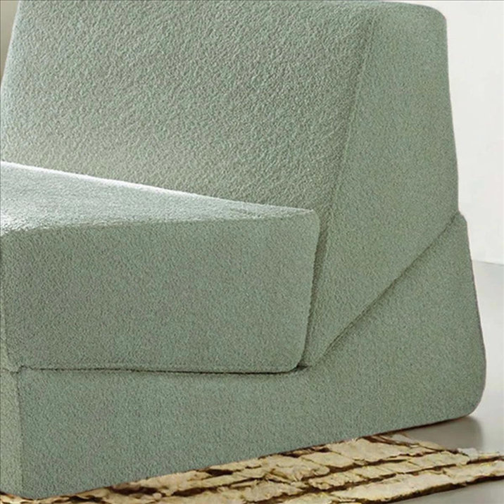 Close-up of the MX DREAM 2-in-1 convertible foam sofa bed, showcasing the clean folding lines and premium textured upholstery with no iron frame