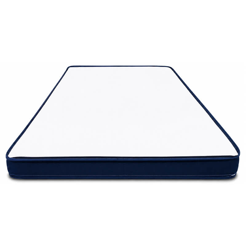 Perspective view looking down a flat mattress showcasing its solid white base underside and premium dark blue edge piping and borders